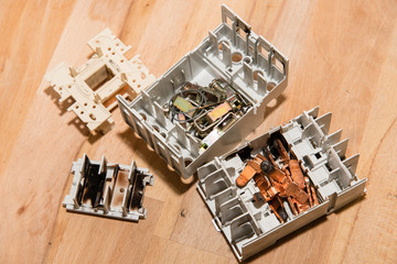 Exploded burnt electric contactor.