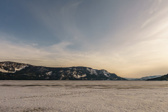 Sunset Landscape Of Frozen Little Shuswap Lake British Columbia Canada.