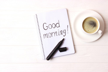  cup of coffee on wooden background top view. Good morning! Have a nice day