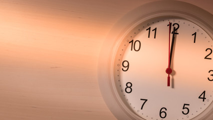 Clock ticking showing twelve hours