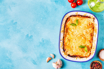 Traditional italian lasagna with vegetables, minced meat and cheese.