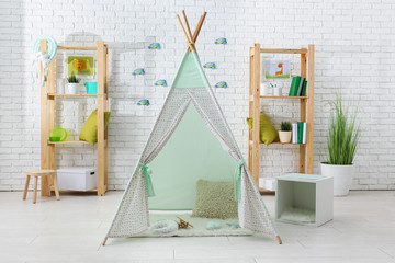 Interior of kids room with play tent