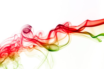 color smoke flowing over white background . abstract .