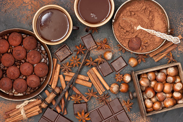 Hot chocolate mug with chocolate and truffles candy, top view