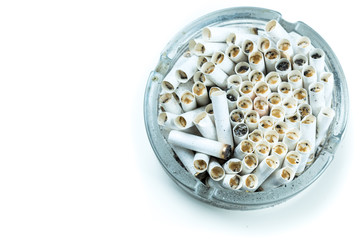 Cigarettes in an ashtray isolated on white background