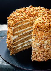 Homemade honey cake (medovik) with sour cream.