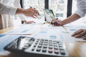 Business casual team manager having a discussion with new project success financial statistics, Partner meeting professional investor working start up project for both company with document