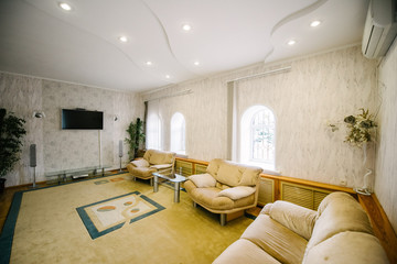 Living room with leather sofa in a country house