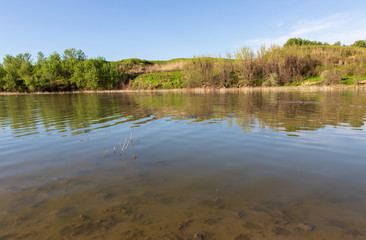 Pond in spring steppe as background