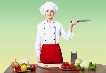 Portrait of young adorable woman cooking