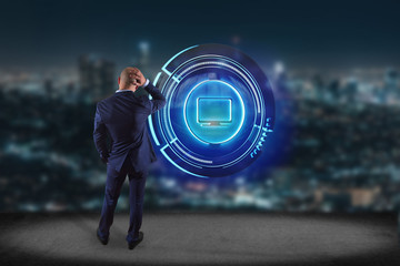 Businessman in front of a wall with a Shinny technologic computer button - 3d render