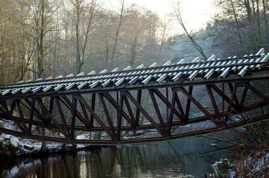 Bridge in the forest over the Gwda River in Poland. Build in 1914, destroyed at the end of World War 2 by German army.