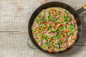 Braised liver with chorizo sausage. The view from the top. Copy-space.    