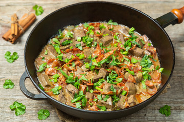 Braised liver with chorizo sausage.  