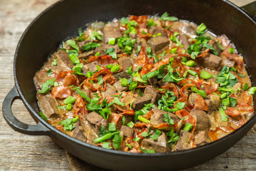 Braised liver with chorizo sausage.  