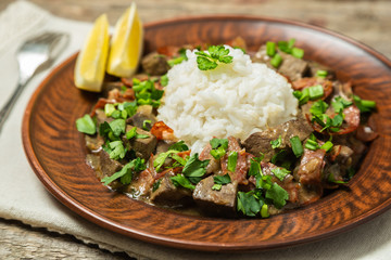 Braised liver with chorizo sausage.  