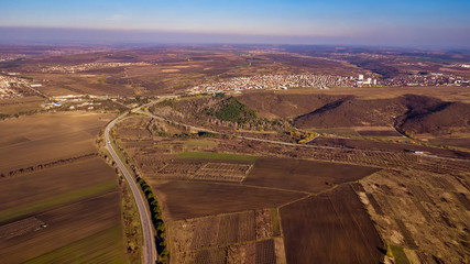Aerial view of suburban road between fields. Moldova republic of.