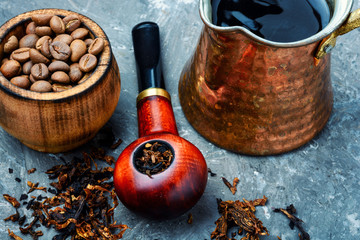 Smoking pipe and coffee
