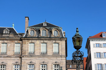 Fototapeta na wymiar lamp-post and historical building - Palais Rohan in Strasbourg - France