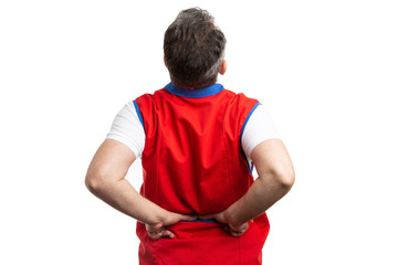 Hypermarket employee stretching spine.