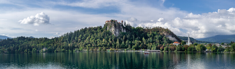Fototapeta na wymiar Amazing large panoramic photo of Bled Castle on rock. Lake Bled . Slovenia