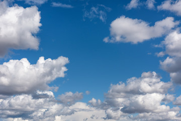 Naklejka na ściany i meble Blue sky with white clouds, Nature background.
