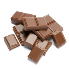Milk organic chocolate pieces isolated on white background