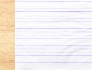 Notebook Lined Paper on wood Background