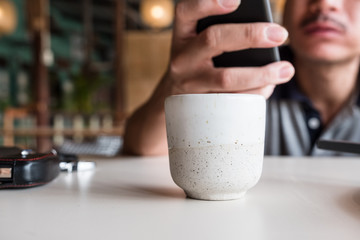 Hot coffee and old man Hold the phone.
