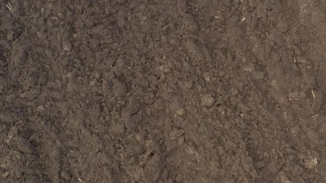 Earth after plowing by late winter 4K drone video