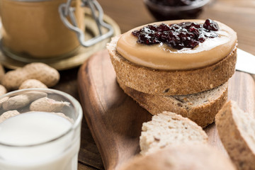 Homemade Healthy Breakfast. Peanut Butter and Jelly on Rustic Wooden Background.