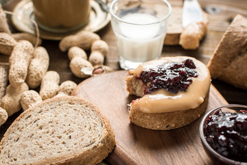 Homemade Healthy Breakfast. Peanut Butter and Jelly on Rustic Wooden Background.