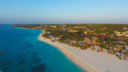 Naklejka na ściany i meble Paradise tropical island white sand beach Zanzibar aerial view