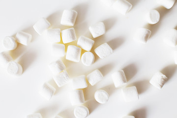 Fototapeta na wymiar marshmallow pyramid. marshmallows on a white background