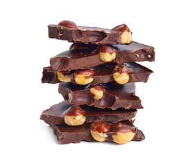 Dark chocolate with hazelnuts. Isolated on white background