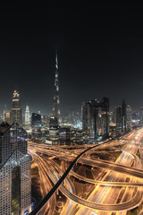 Fototapeta premium City Skyline and cityscape at night in Dubai. UAE 