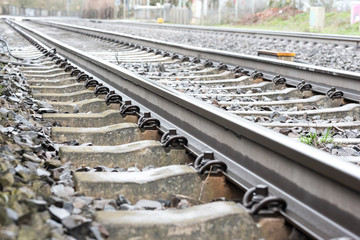 railway tracks in a track bed with stones in detail