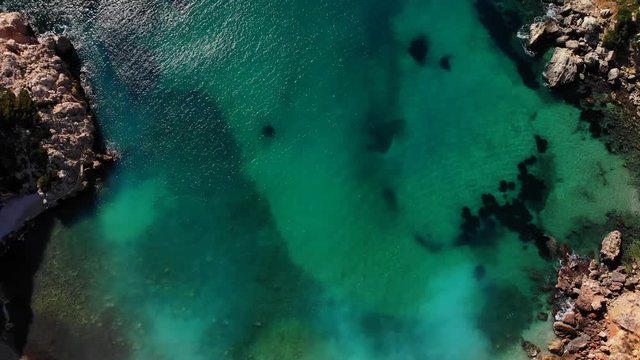 Aerial drone view of Granadella cove beach in Javea, Spain