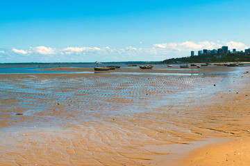 Fishermen boats in the Indian Ocean at low tide