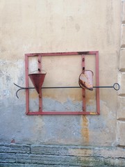old set of items to extinguish fires on the wall   