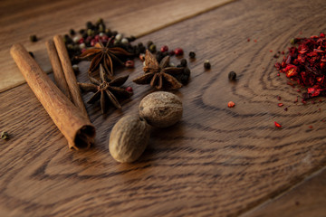Spices on wooden background. For poster, card, banner, flyer, menu.