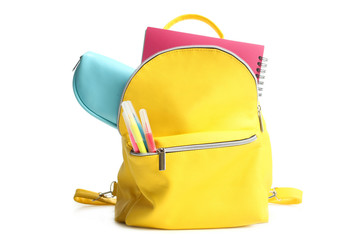 Fototapeta yellow backpack with different school supplies obraz