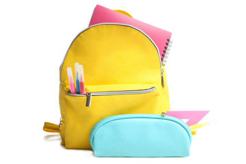 Fototapeta yellow backpack with different school supplies obraz