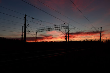 Bloody sunset on the railway