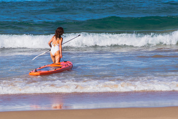 The girl on the sap surfing and the Indian Ocean Africa Mozambique