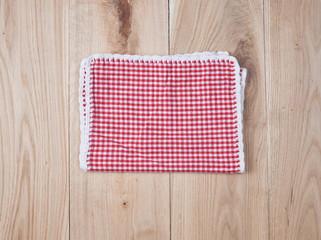 red textile towel in a white cell