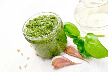Pesto in jar on board