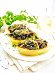 Potatoes stuffed with mushrooms on towel