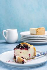 Cheesecake slice. Berry topping. Close view. Copy space.