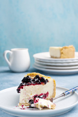 Cheesecake slice. Berry topping. Close view. Copy space.